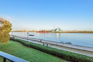 Positioned in a prime riverside setting in the Royal Borough of Greenwich, this well-proportioned two-bedroom apartment at Tideside Court enjoys far-reaching views across the iconic River Thames